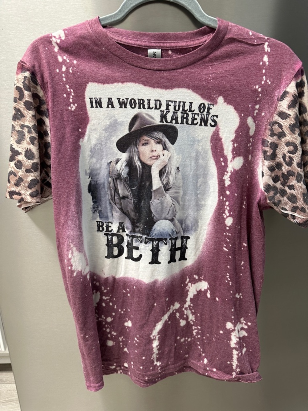 In A World Full Of Karens Be A Beth Graphic Tee - Mauve with Leopard Sleeves